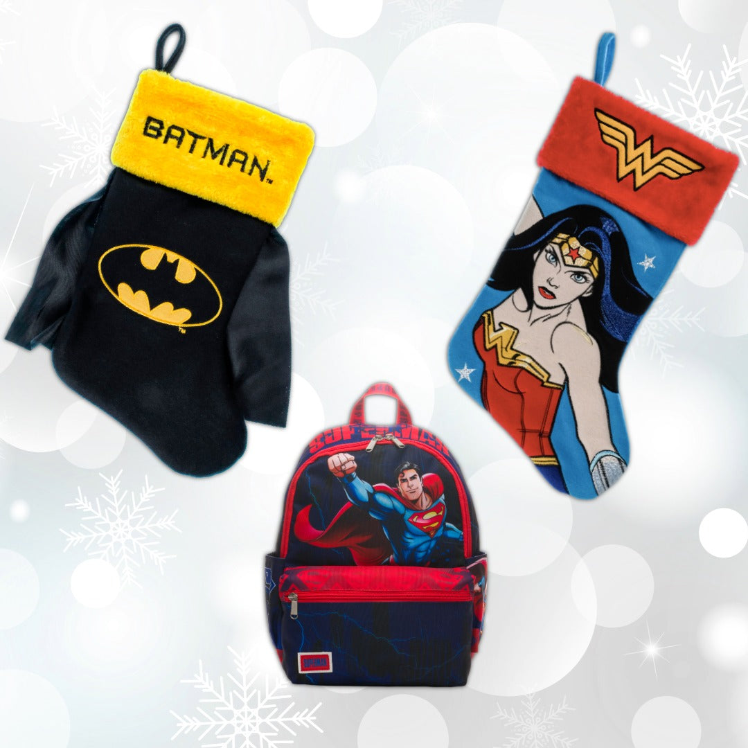 Examples of DC gifts and decor: a Batman Christmas stocking, Wonder Woman Christmas stocking, and Superman mini backpack