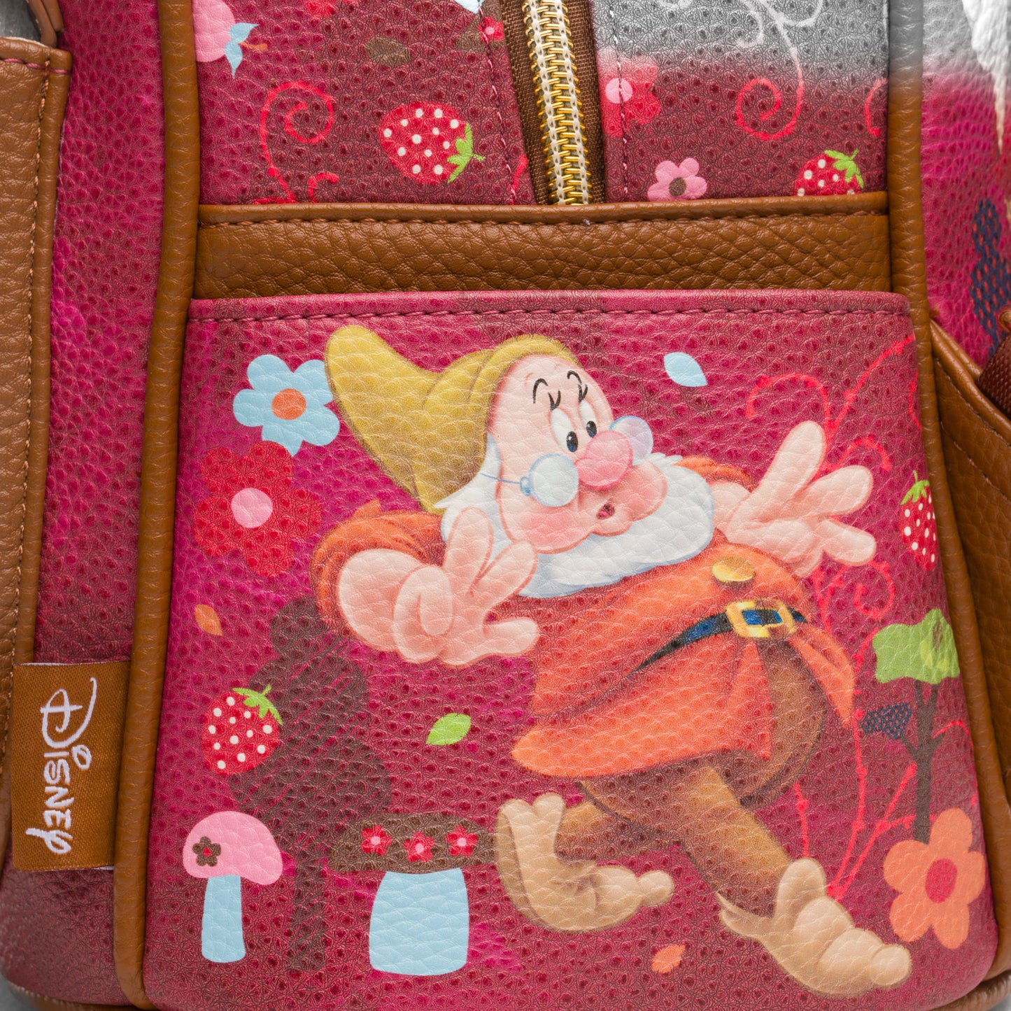 
                  
                    Disney's Snow White -- The Seven Dwarfs WondaPop 11" Vegan Leather Fashion Mini Backpack
                  
                