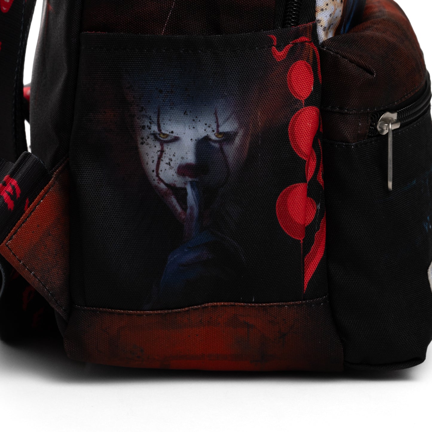 
                  
                    Pennywise from It 13-inch Nylon Mini Small Backpack
                  
                