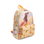 A Disney Beauty and the Beast themed backpack in a warm beige and yellow color palette, featuring character prints of Belle on the front and Mrs. Potts with Chip on the right side pocket, with a deep yellow top handle. 