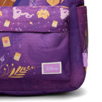 Close-up of a purple Disney backpack featuring a printed pattern with characters, flowers, stars, and leaves, including a visible Disney label on the front pocket.