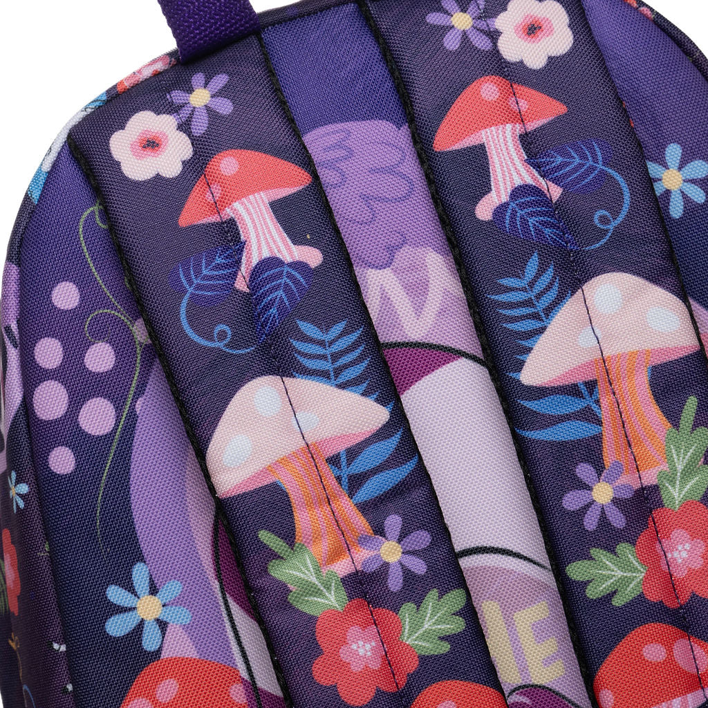 Close-up of a WondaPop Disney Cheshire Cat - Alice in Wonderland 16" School Backpack fabric with a colorful mushroom and floral print, showing padded vertical compartments and a small purple top handle.