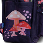 Close-up of WondaPop Disney Cheshire Cat - Alice in Wonderland 16" School Backpack  right side featuring a colorful mushroom print with pink, red, and orange mushrooms, white spots, and lavender dots.