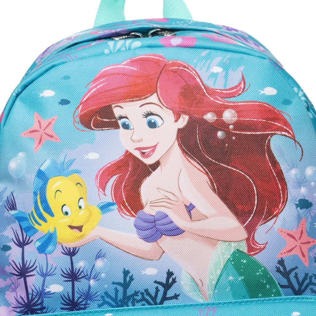 A close up of a Disney Ariel and Flounder backpack featuring a colorful underwater design with Ariel, Flounder, sea stars, and coral on a light blue background.