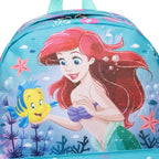 A close up of a Disney Ariel and Flounder backpack featuring a colorful underwater design with Ariel, Flounder, sea stars, and coral on a light blue background.