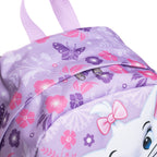 Close-up of the top of a light purple children's backpack with a butterfly and floral print, featuring a zipper pull for a large main pocket and lavender handle. A print of Marie's face is just visible in the bottom right hand corner. 
