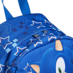 Close-up of the top of a blue backpack featuring Sonic the Hedgehog graphics, including star patterns.
