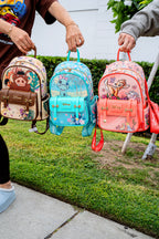 Three Disney Loungefly mini backpacks — Pumbaa, Stitch, and Bambi designs — being held side by side outdoors