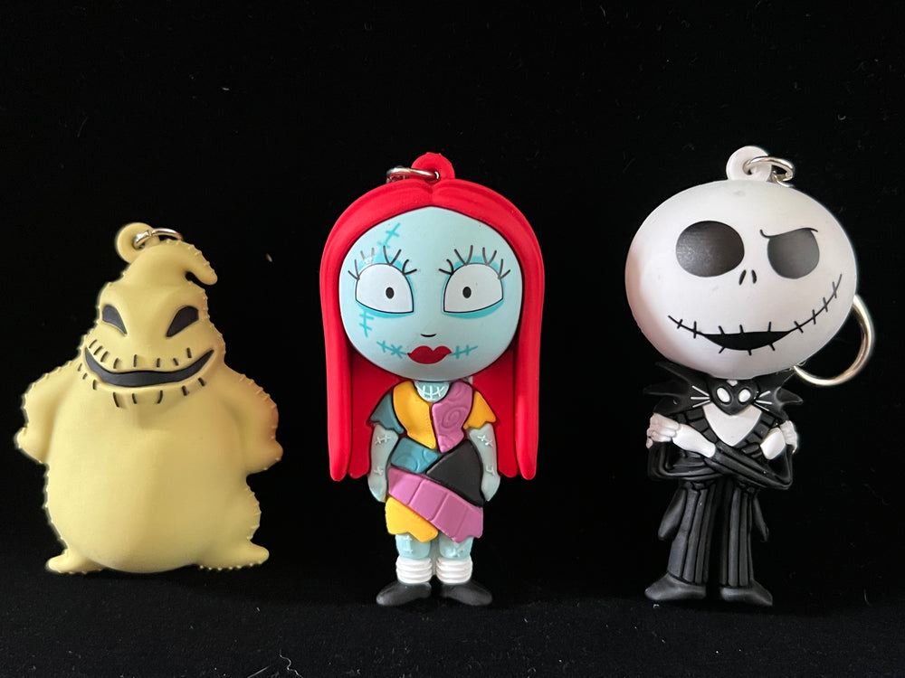 Disney The Nightmare Before Christmas 3-pack of solid rubber keychains featuring Jack, Sally, and Oogie Boogie